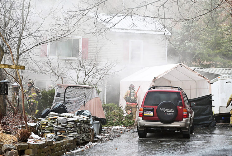 Two residents, seven cats rescued from Patton house fire